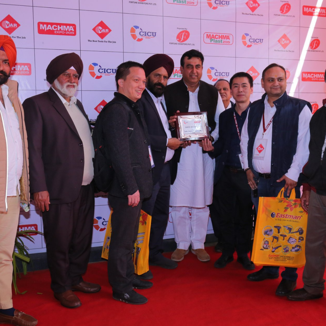 Group felicitation photo at MACHMA Expo